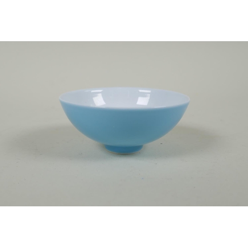 253 - A Chinese powder blue glazed porcelain tea bowl, GuangXu 6 character mark to base, 8cm diameter