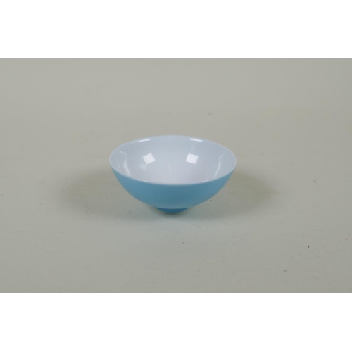 253 - A Chinese powder blue glazed porcelain tea bowl, GuangXu 6 character mark to base, 8cm diameter