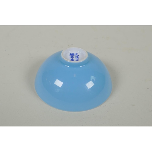 253 - A Chinese powder blue glazed porcelain tea bowl, GuangXu 6 character mark to base, 8cm diameter