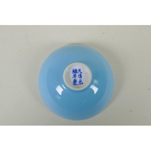 253 - A Chinese powder blue glazed porcelain tea bowl, GuangXu 6 character mark to base, 8cm diameter