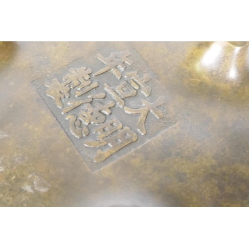 254 - A Chinese bronze censer with Islamic script decoration and seal mark to base, 13cm diameter, 10cm hi... 