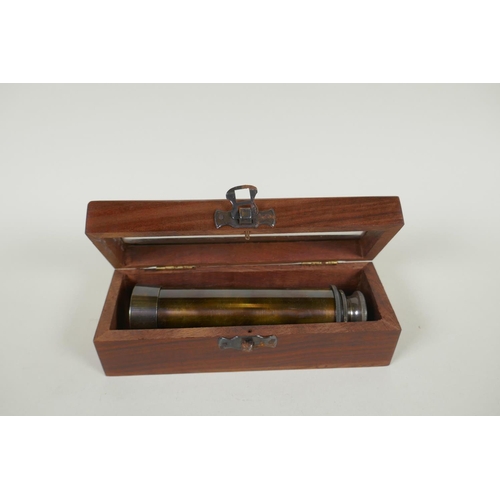 256 - A boxed reproduction 'W. Ottway & Co' brass three draw telescope, and a reproduction brass Marin... 