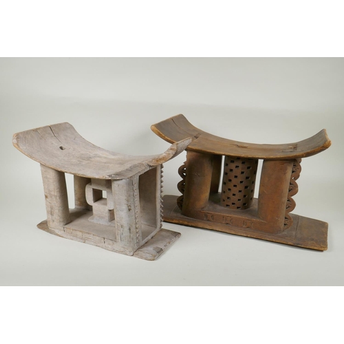 261 - An African Ashanti tribe carved wood stool and another smaller, both first half of the C20th, AF rep... 