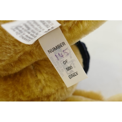 269 - A Merrythought Harrods Millenium Limited Edition teddy bear, No 145/500, 24cm high, and a Harrods pl... 