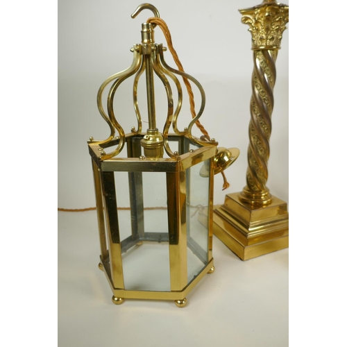 272 - A brass Corinthian column table lamp, a pair of brass and glass hexagonal lanterns and four picture ... 