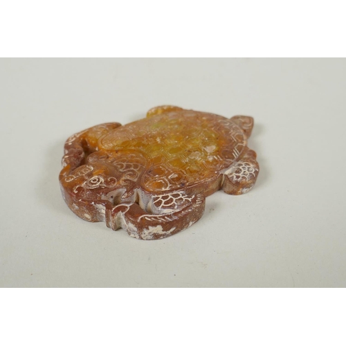 275 - A Chinese carved and pierced hardstone pendant in the form of a dragon turtle, 9cm long