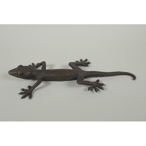 277 - A bronze figure of a gekko, 28cm ong