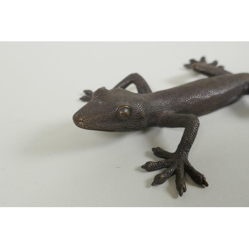 277 - A bronze figure of a gekko, 28cm ong