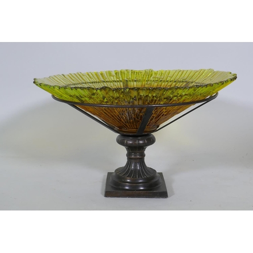 28 - A studio amber glass bowl, raised n a bronzed metal stand, 38cm diameter, 24cm high