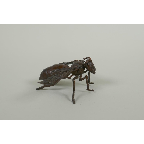 280 - A Japanese style bronze okimono wasp, 10cm wide