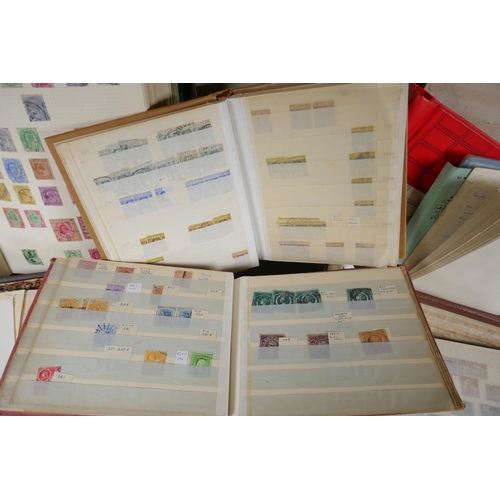 282 - A large quantity of C19th, C20th and world postage stamps in albums, loose and attached to postcards... 