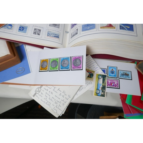 283 - A large quantity of C19th, C20th and world postage stamps in albums, loose and attached to postcards... 