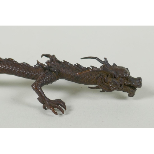 285 - A Japanese style bronze okimono dragon, 16cm high