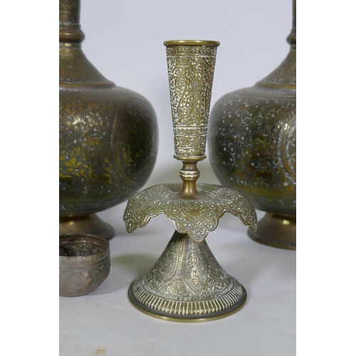 29 - A pair of Indian brass vases with repousse decoration, 29cm high, a candlestick, a white metal dish ... 