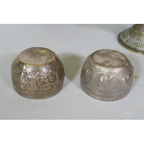 29 - A pair of Indian brass vases with repousse decoration, 29cm high, a candlestick, a white metal dish ... 