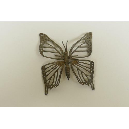 296 - A Japanese style bronze okimono butterfly with articulated wings, 7cm 