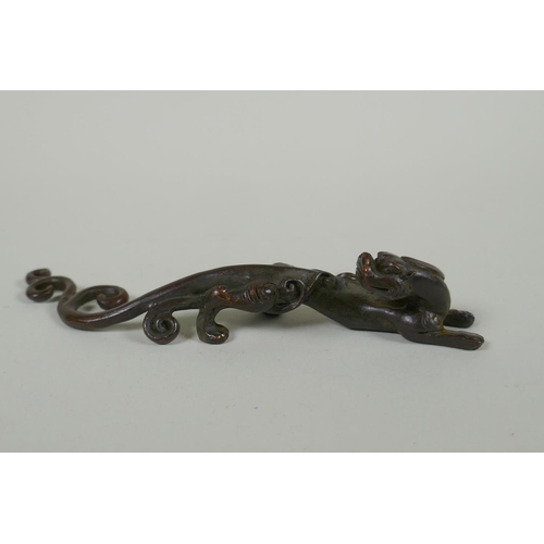 298 - A Chinese bronze kylin, mark to base, 16cm