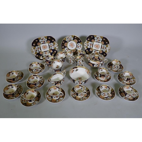 3 - A Staffordshire Imari pattern six place tea set, with twelve spare cups, 42 pieces