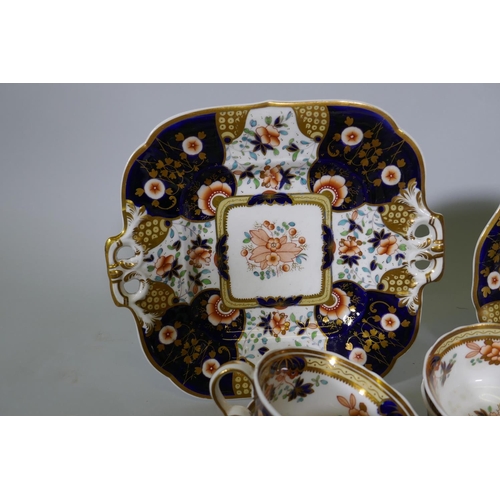 3 - A Staffordshire Imari pattern six place tea set, with twelve spare cups, 42 pieces