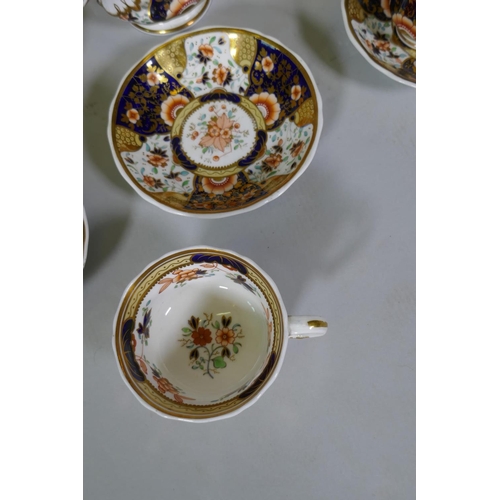 3 - A Staffordshire Imari pattern six place tea set, with twelve spare cups, 42 pieces