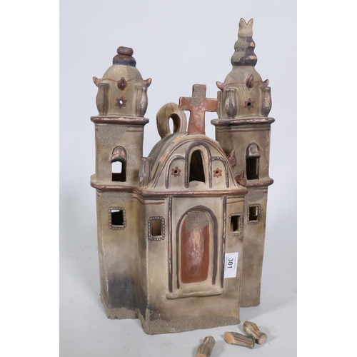 301 - A painted terracotta model/pastille burner of a basilica, 46cm high, AF, losses, repairs