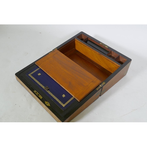 32 - A Victorian burr walnut writing slope with brass mounts and fitted interior with inset leather slope