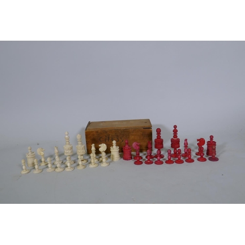 33 - A C19th stained bone chess set, king 9.5cm high