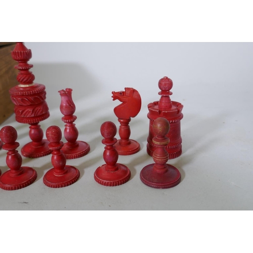 33 - A C19th stained bone chess set, king 9.5cm high