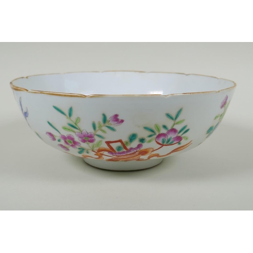 43 - A late C19th Chinese famille rose porcelain bowl with lobed rim, decorated with flowers and emblems ... 