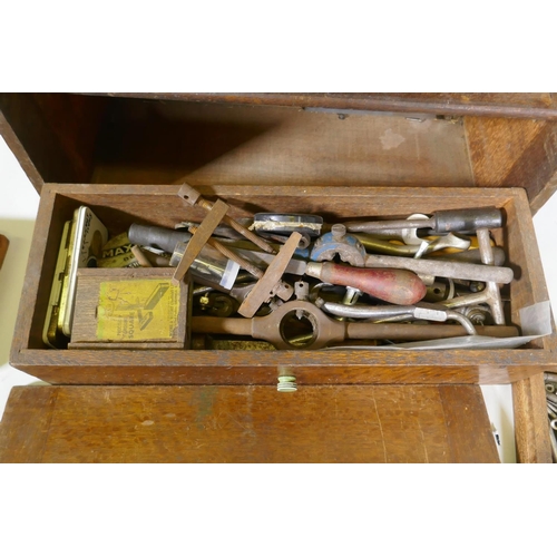 44 - An antique mahogany tool chest containing vintage engineer's tools