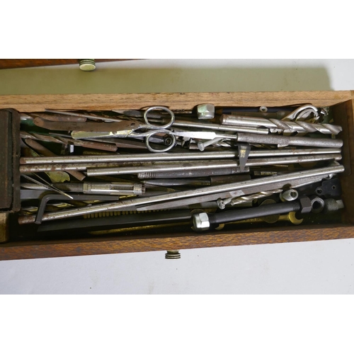 44 - An antique mahogany tool chest containing vintage engineer's tools