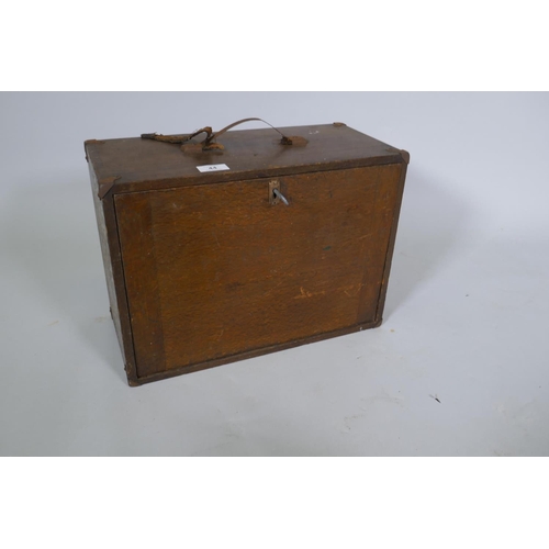 44 - An antique mahogany tool chest containing vintage engineer's tools