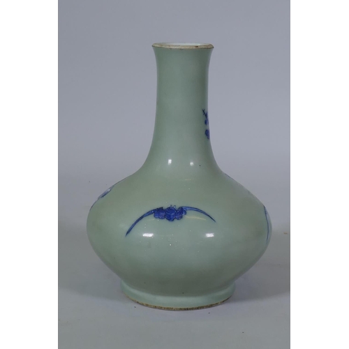 5 - A Chinese celadon glazed vase with raised blue and white decoration of birds and bats, C19th/C20th, ... 