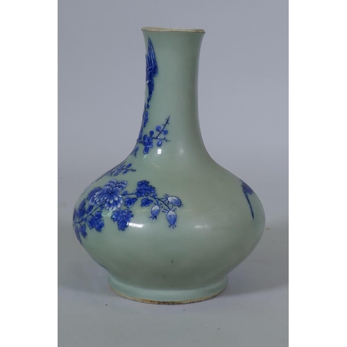 5 - A Chinese celadon glazed vase with raised blue and white decoration of birds and bats, C19th/C20th, ... 