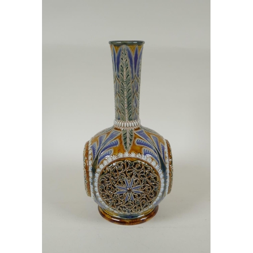 6 - A C19th Doulton Lambeth stoneware vase by Emily E. Stormer, decorated with raised reticulated floral... 