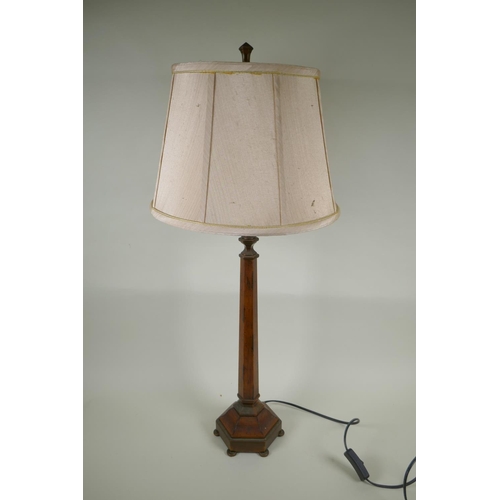 66 - A grained wood and brass hexagonal column table lamp, 80cm high