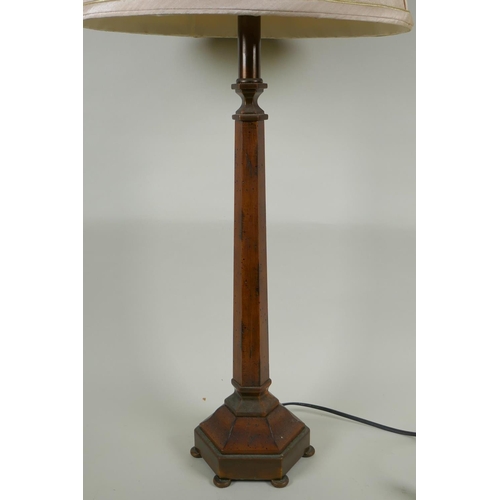 66 - A grained wood and brass hexagonal column table lamp, 80cm high