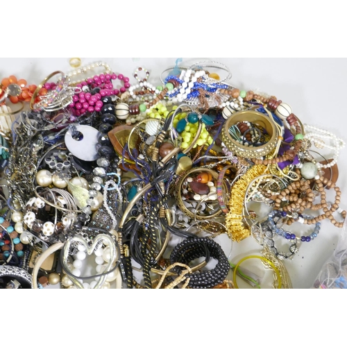 666 - A quantity of costume jewellery, 18kg