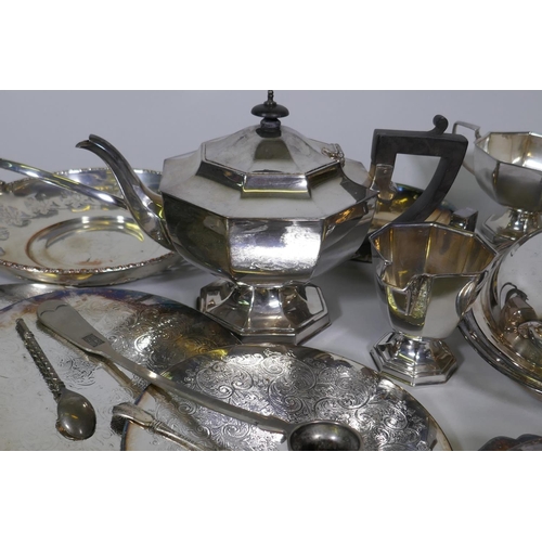 668 - A quantity of silver plate to include a three piece tea set, serving tureens, goblets, etc, and a qu... 