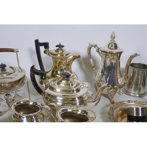 674 - A silver plate spirit kettle on stand, four piece tea set, Maltese vase, various silver plated ware,... 