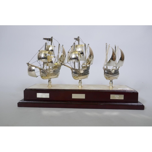 675 - A silver plated sailing trophy, the three ships of Columbus, on a wood base, 43 x 15 x 26cm