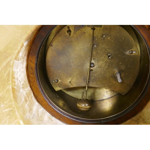 677 - A C19th French alabaster mantel clock with enamelled dial and Brevete spring driven movement