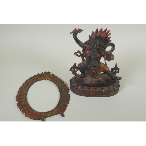 70 - A Tibetan bronze figure of Vajrapani with remnants of gilt patina, 24cm high