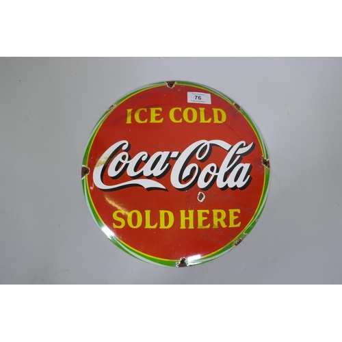 76 - A Coca Cola vintage style enamelled metal sign, 30cm diameter