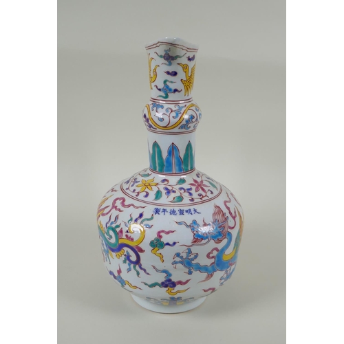 85 - A Chinese polychrome porcelain ewer decorated with dragons and birds, in bright enamels, Xuande 6 ch... 