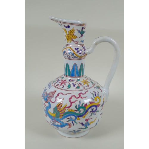 85 - A Chinese polychrome porcelain ewer decorated with dragons and birds, in bright enamels, Xuande 6 ch... 