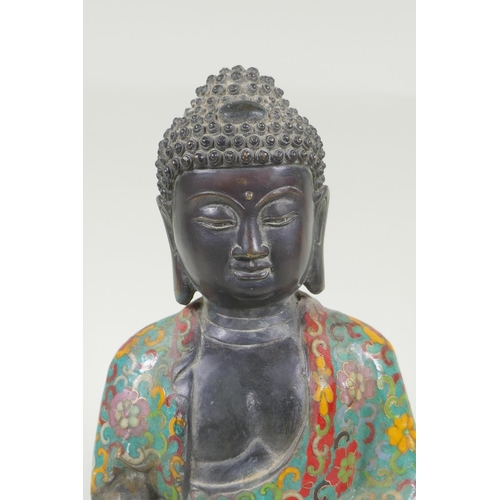 88 - A Chinese bronze Buddha in a cloisonne robe, mark to base, 27cm high