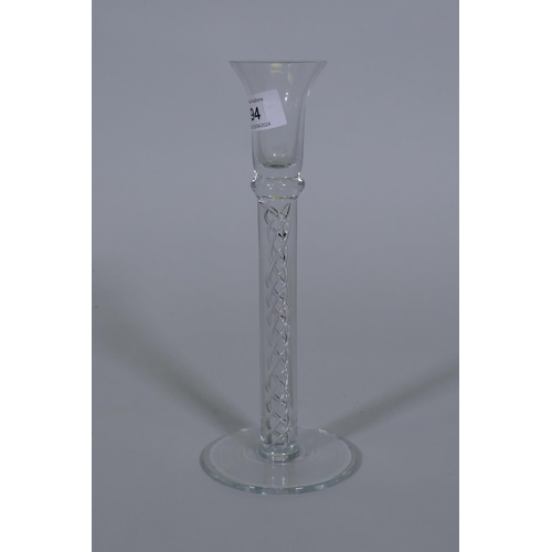 94 - A Georgian style glass candlestick with air twist stem, 25cm high