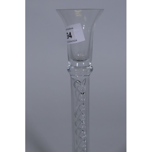 94 - A Georgian style glass candlestick with air twist stem, 25cm high