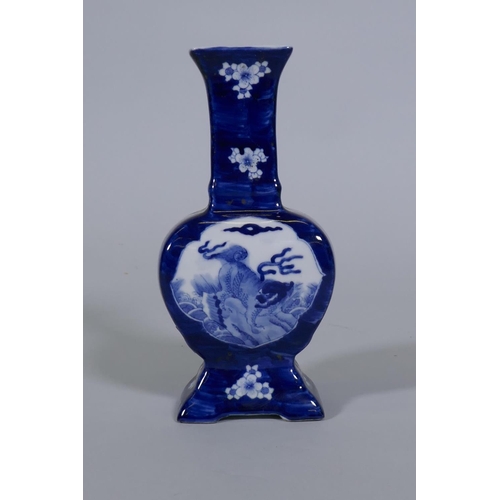 96 - A Chinese blue and white vase with kylin and prunus blossom decoration, 24cm high